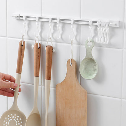 📢1 kaufen, 1 gratis dazu👍Multifunktionaler Schiebehaken – Montage ohne Bohren, verstellbarer Hakenabstand. Hält Geschirr, Handtücher & Bademäntel – keine Beschädigung der Wand! 🏠✨